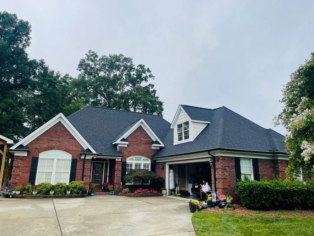 Slide of Tectum Roofing & Construction