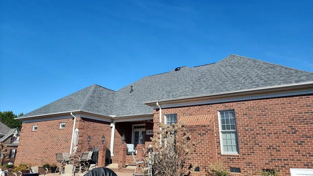 Slide of Tectum Roofing & Construction