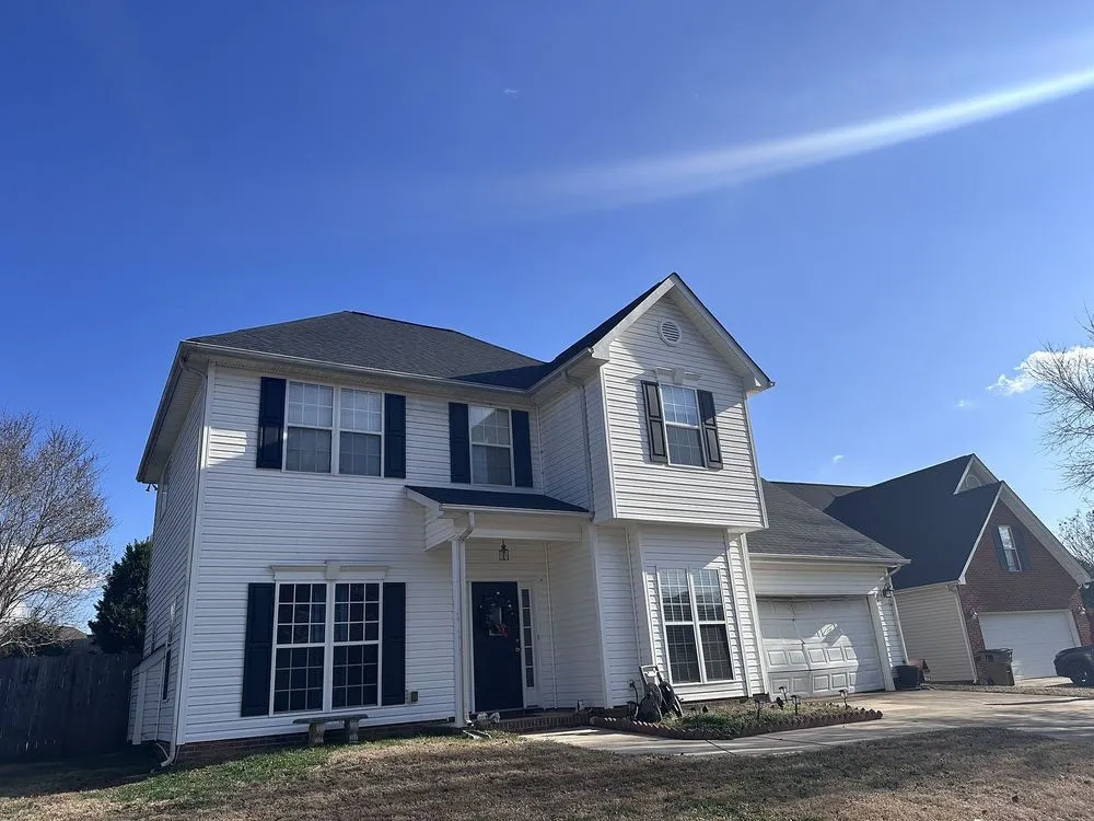 Slide of Tectum Roofing & Construction