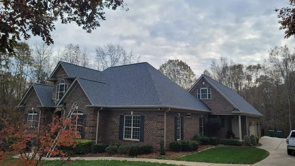 Slide of Tectum Roofing & Construction