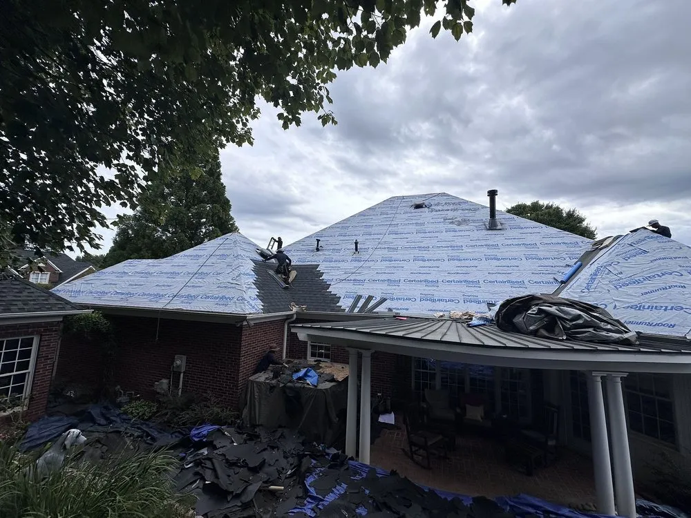 Slide of Tectum Roofing & Construction