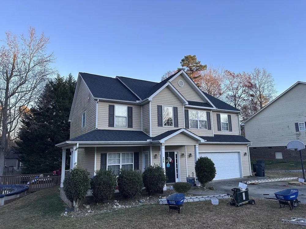 Slide of Tectum Roofing & Construction