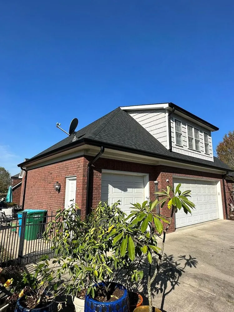 Slide of Tectum Roofing & Construction