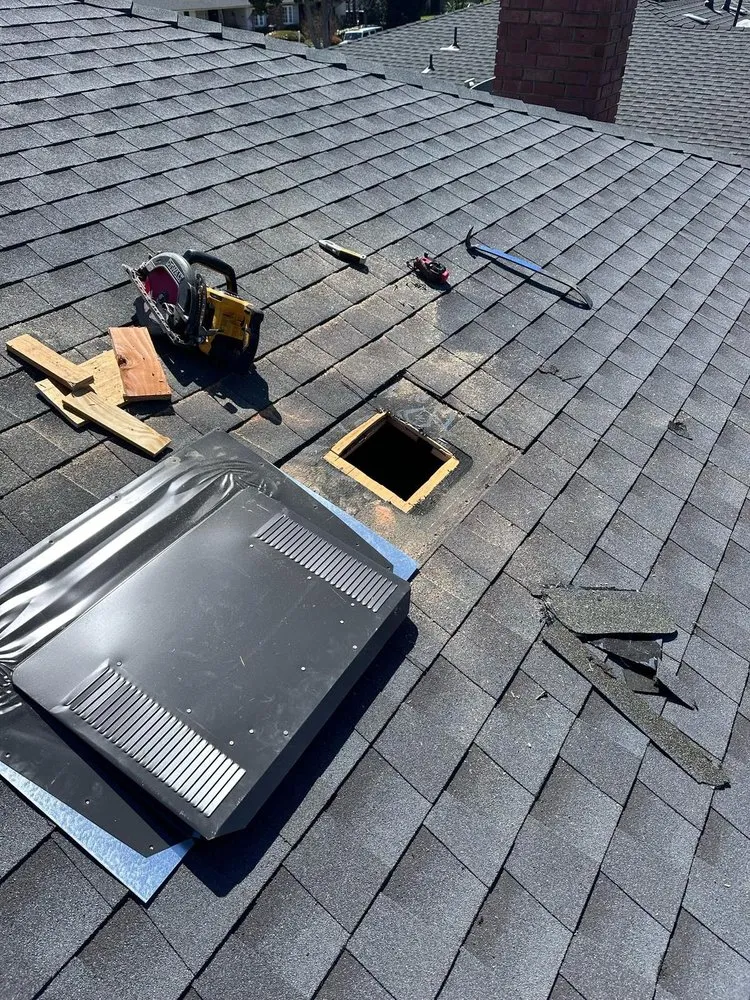 Slide of Tecun’s Roofing