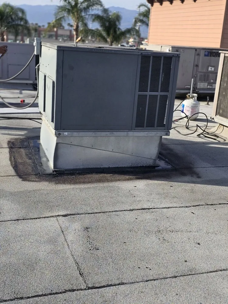 Slide of Tecun’s Roofing