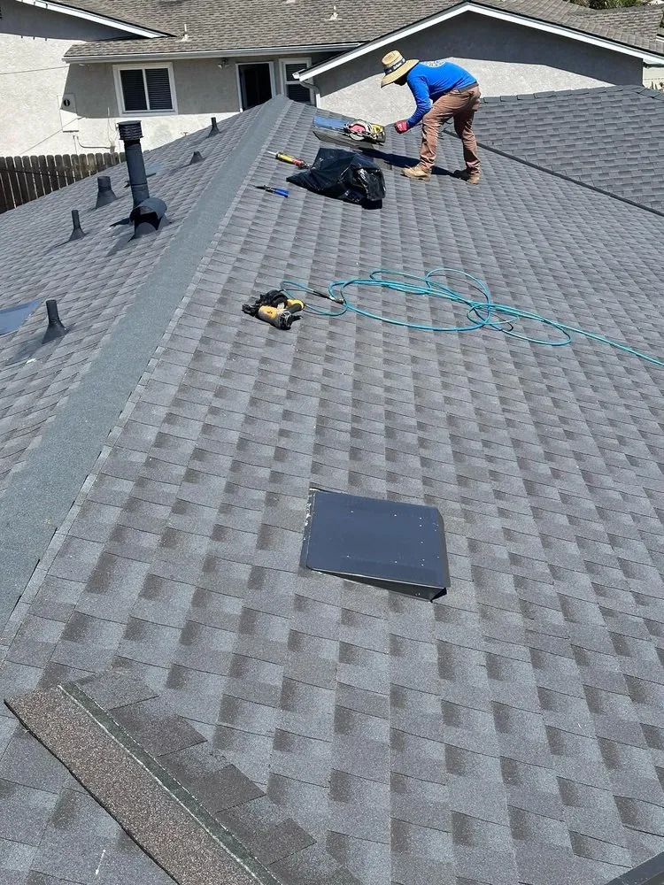 Slide of Tecun’s Roofing