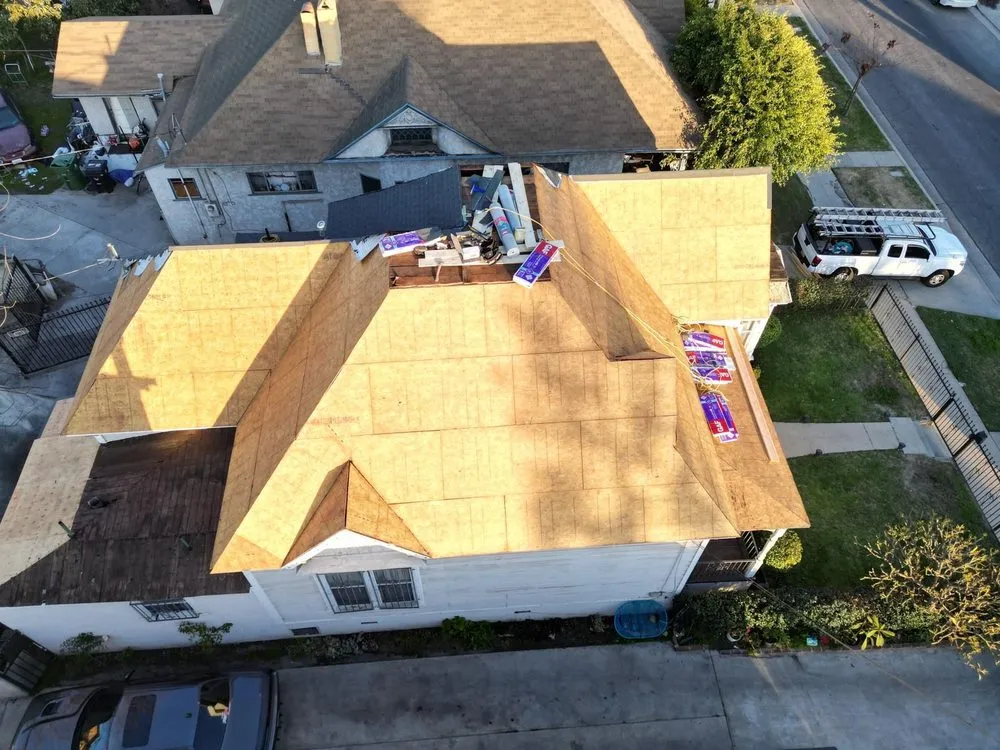 Slide of Tecun’s Roofing