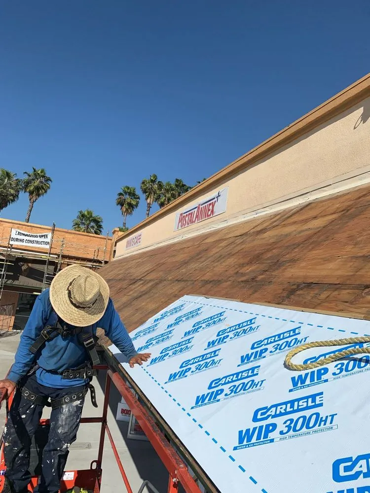 Slide of Tecun’s Roofing