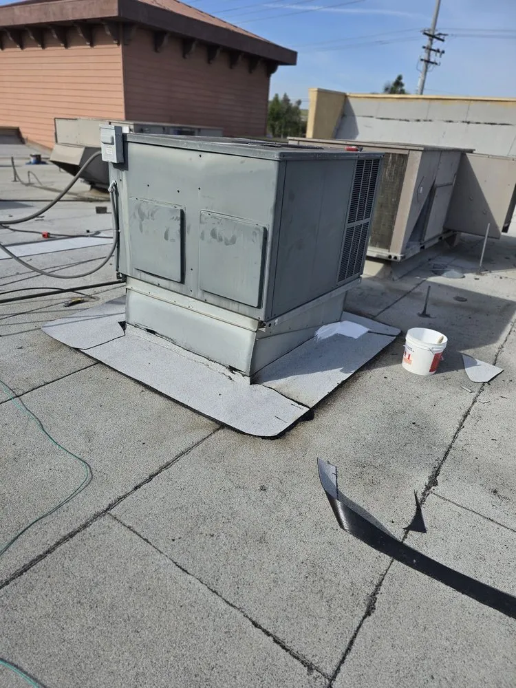 Slide of Tecun’s Roofing