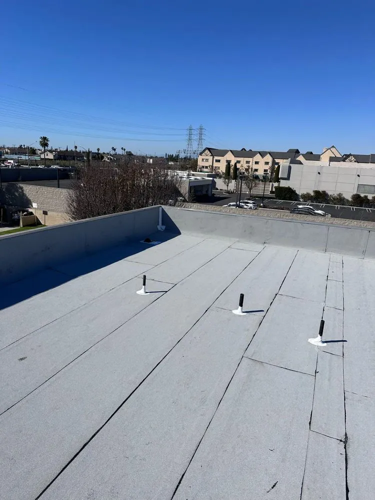 Slide of Tecun’s Roofing