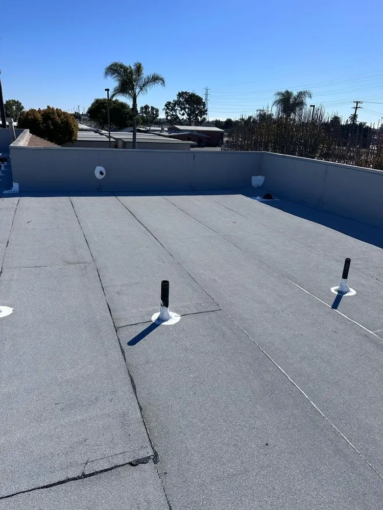 Slide of Tecun’s Roofing