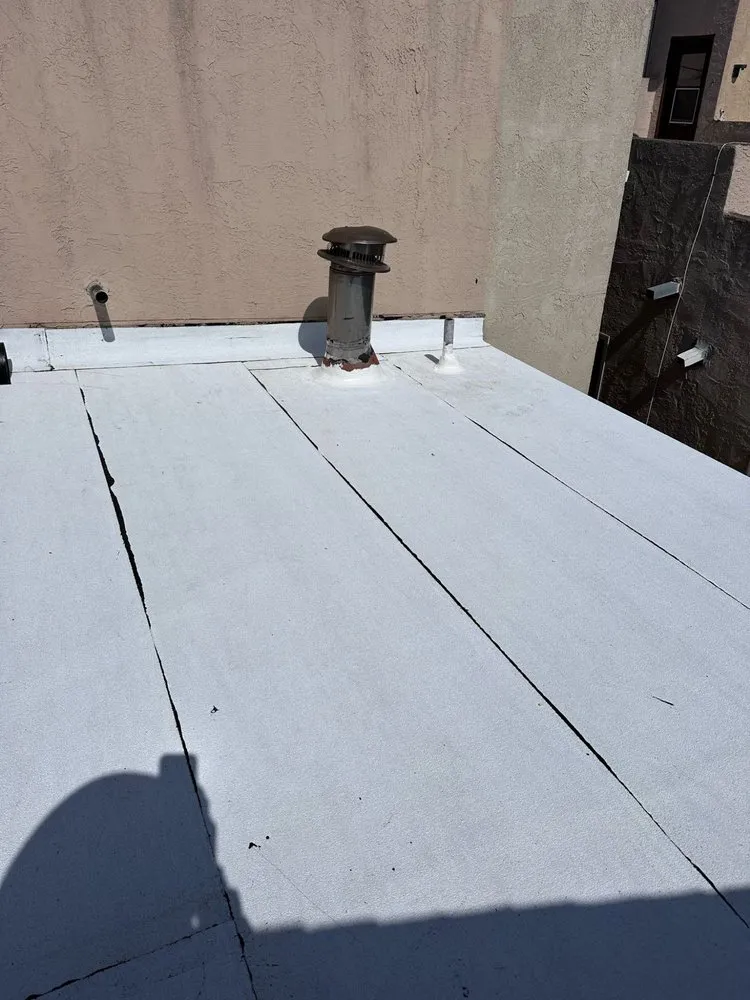 Slide of Tecun’s Roofing