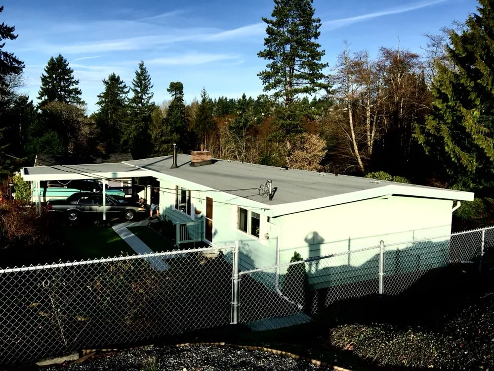 Slide of Tedrick's Roofing