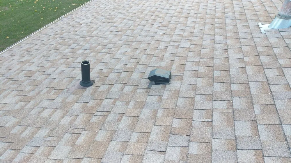 Slide of TedS Roofing