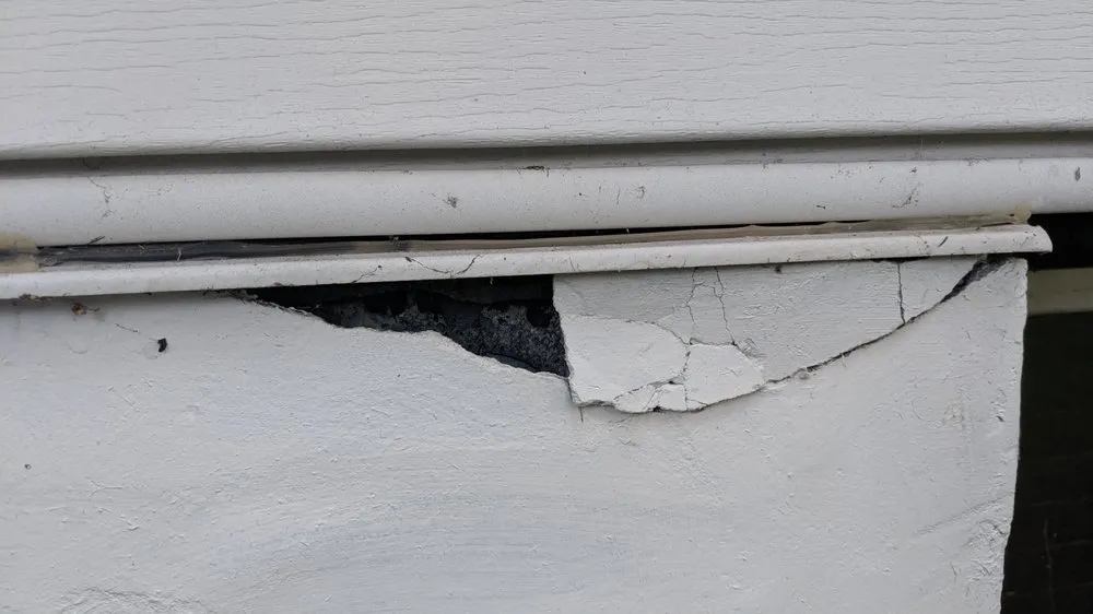 Slide of TedS Roofing