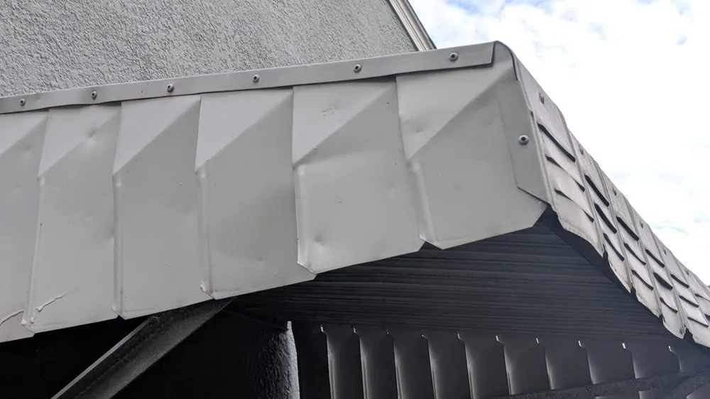 Slide of TedS Roofing