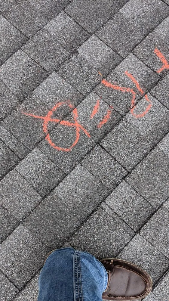 Slide of TedS Roofing