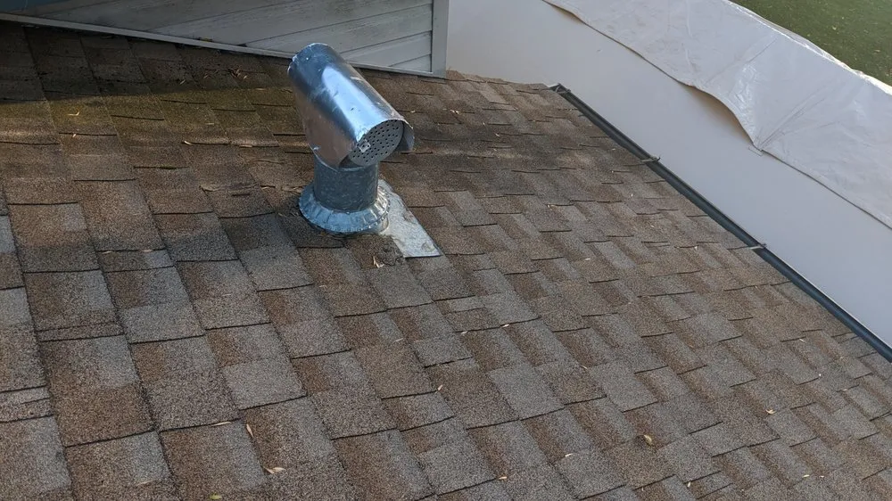 Slide of TedS Roofing