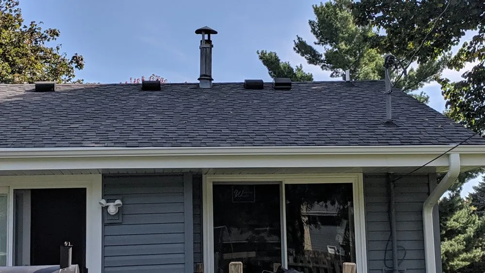 Slide of TedS Roofing