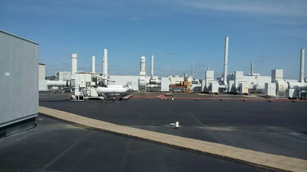 Slide of Tek Roofing Company