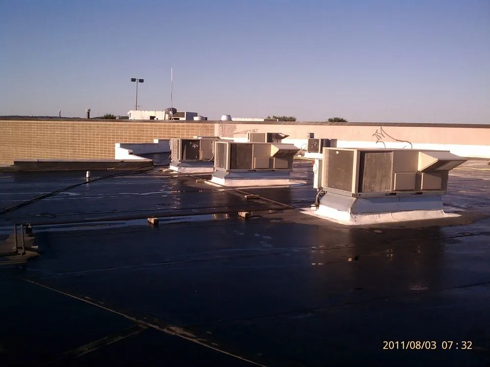 Slide of Tek Roofing Company