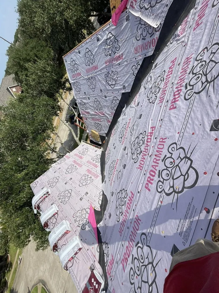 Slide of Tellomade Roofing & Construction