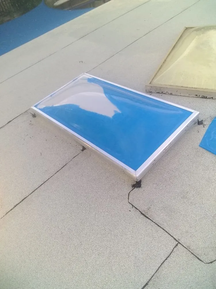 Slide of Tello's Roofing