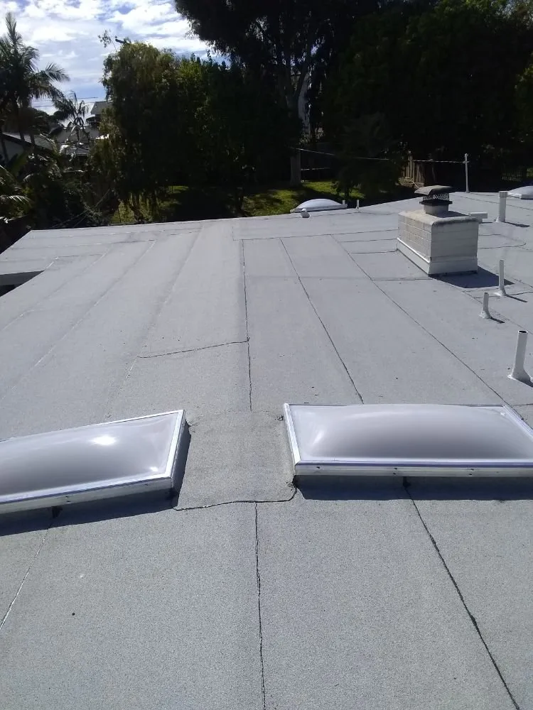 Slide of Tello's Roofing