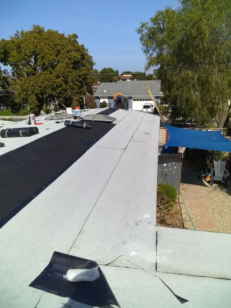 Slide of Tello's Roofing