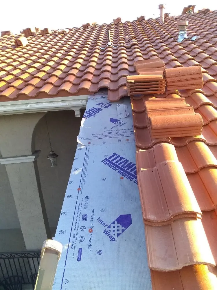 Slide of Tello's Roofing