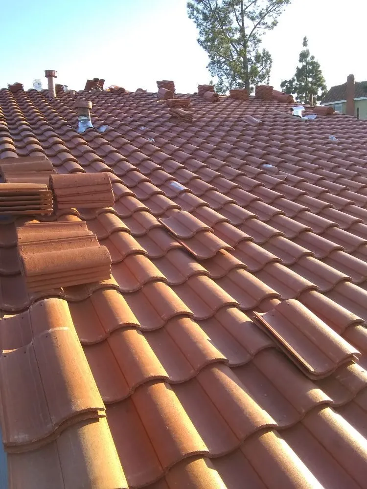 Slide of Tello's Roofing