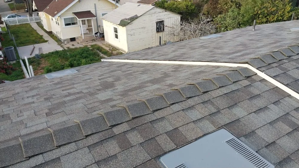 Slide of Tello's Roofing