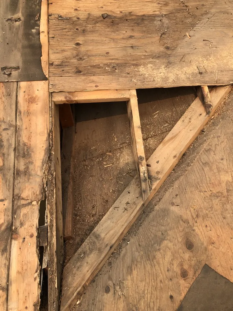 Slide of Tello's Roofing