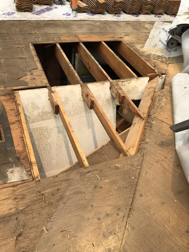 Slide of Tello's Roofing