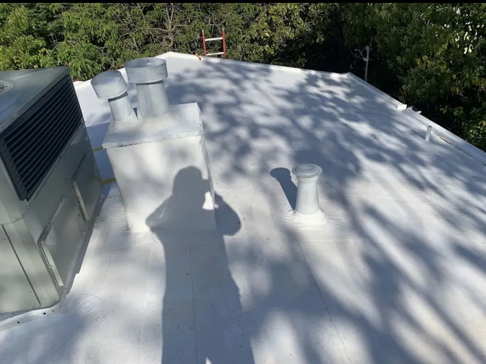 Slide of Telos Roofing & Contracting