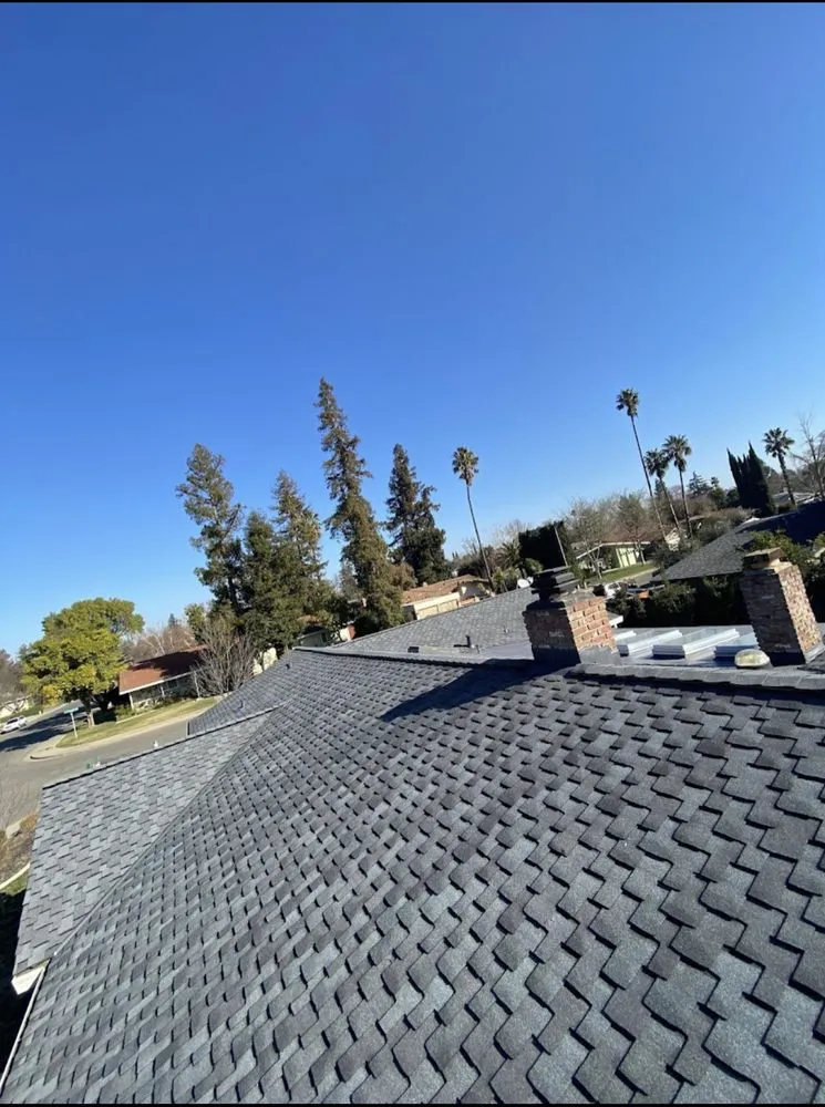 Slide of Telos Roofing & Contracting