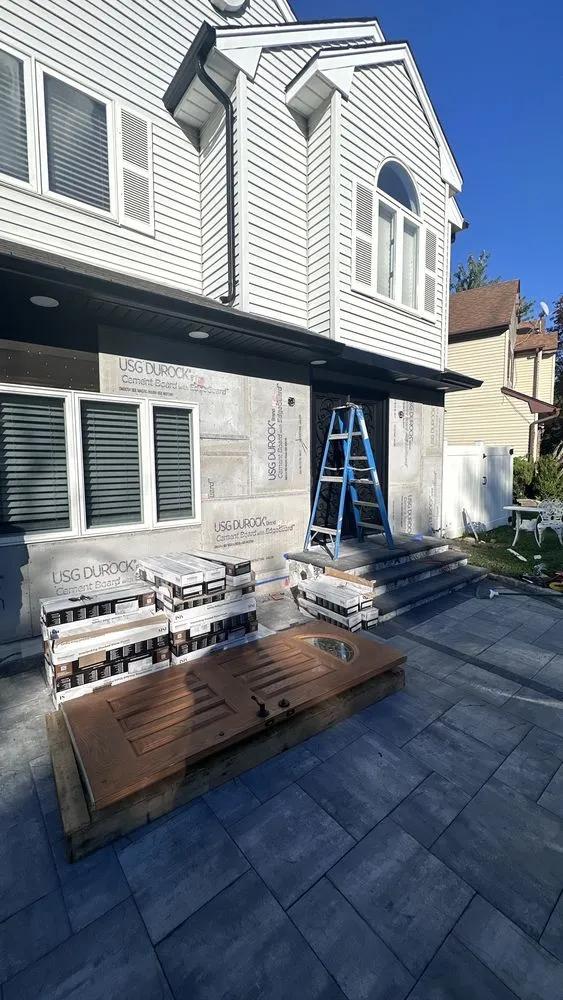 Slide of Telos Roofing & Contracting