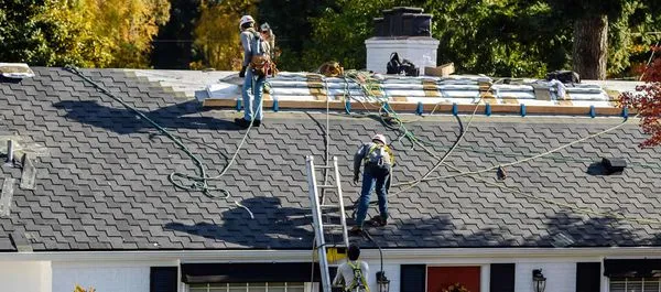 Telos Roofing & Contracting Logo