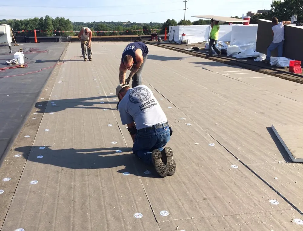 Slide of TEMA Roofing Services