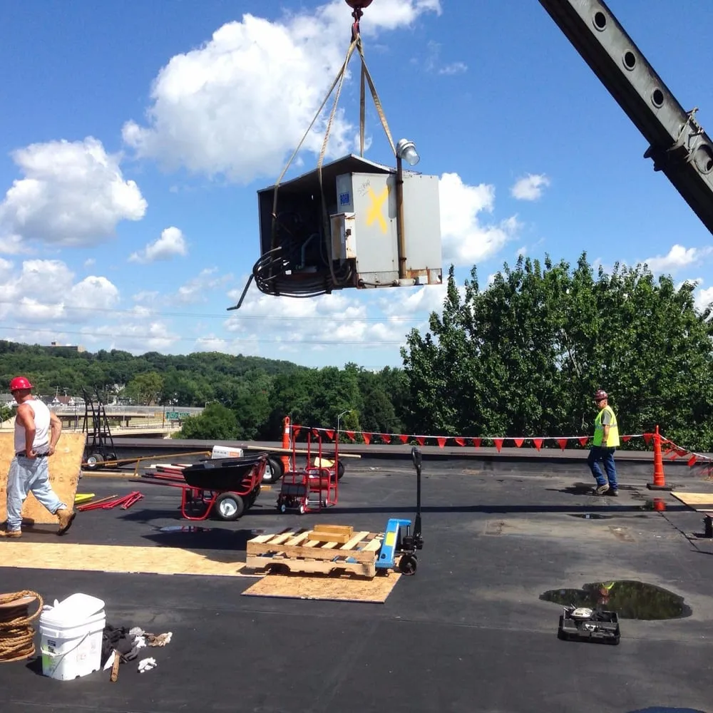 Slide of TEMA Roofing Services