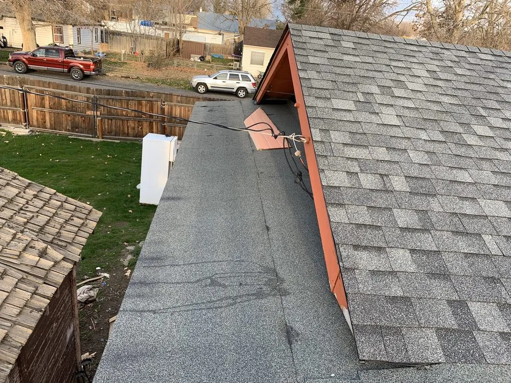 Slide of Tenorio Roofing