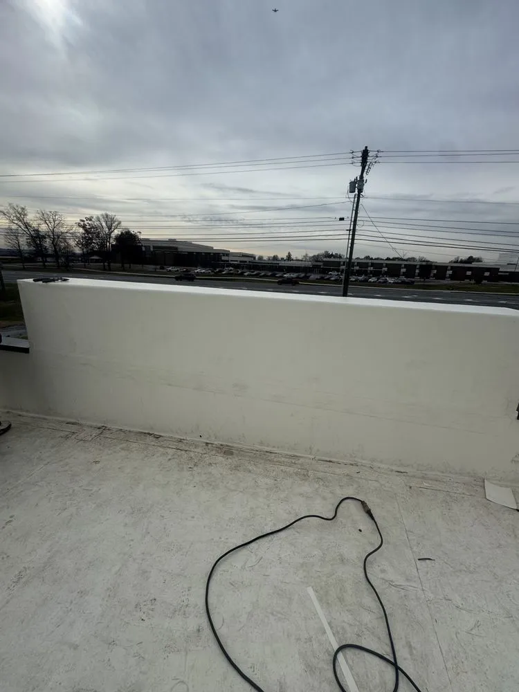 Slide of Teo & Son’s Roofing Company