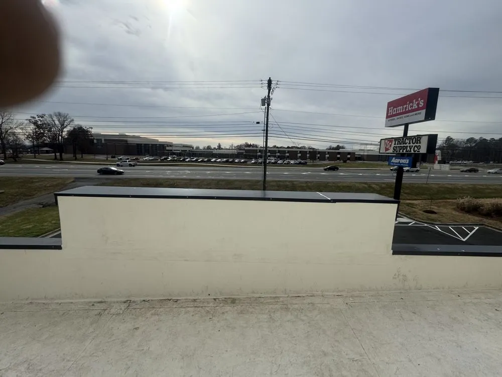 Slide of Teo & Son’s Roofing Company