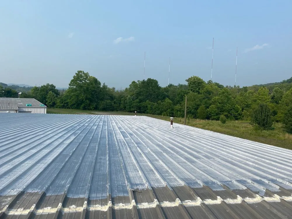 Slide of Teo & Son’s Roofing Company