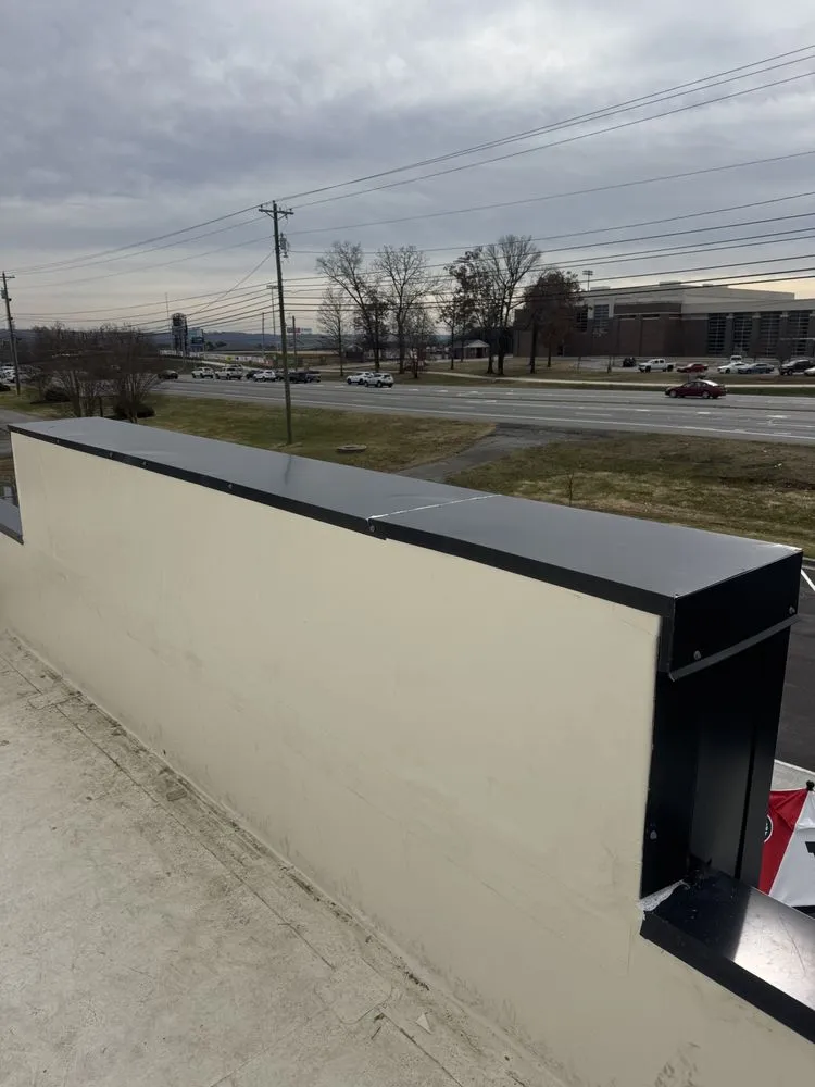 Slide of Teo & Son’s Roofing Company