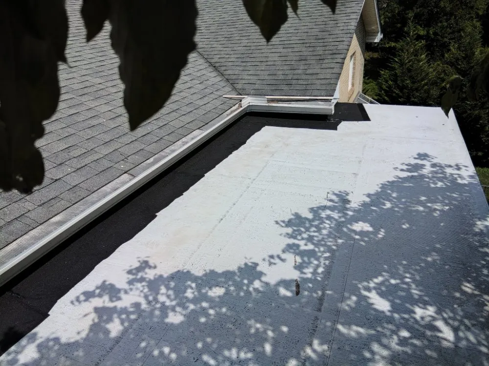 Slide of Terry Ewell the Roofer