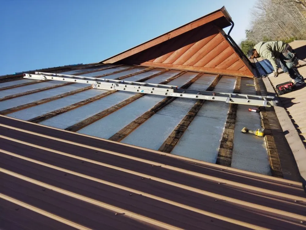 Slide of Terry Ewell the Roofer