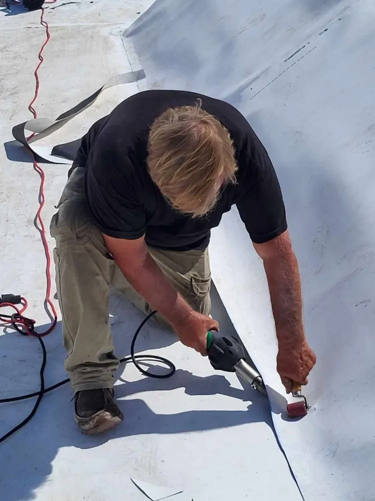 Slide of Terry Ewell the Roofer