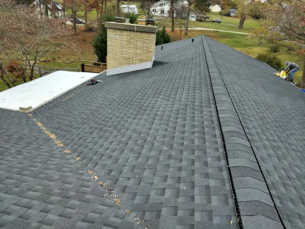 Slide of Terry Ewell the Roofer