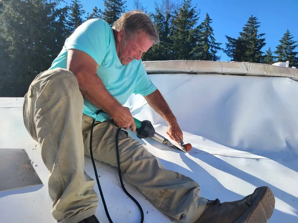 Slide of Terry Ewell the Roofer